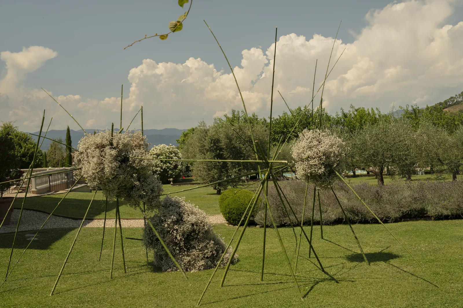 Art installation across the private Tuscan garden at Villa Marie