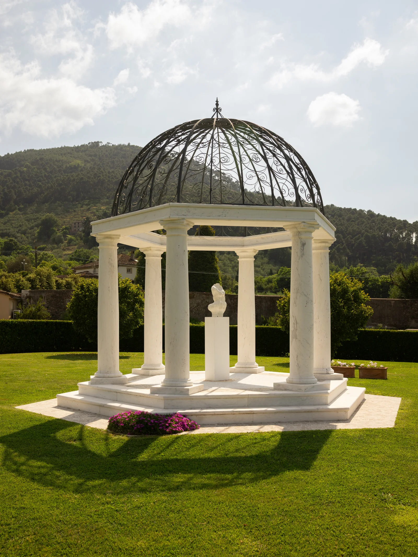 White marble wedding gazebo in the Villa Marie gardens