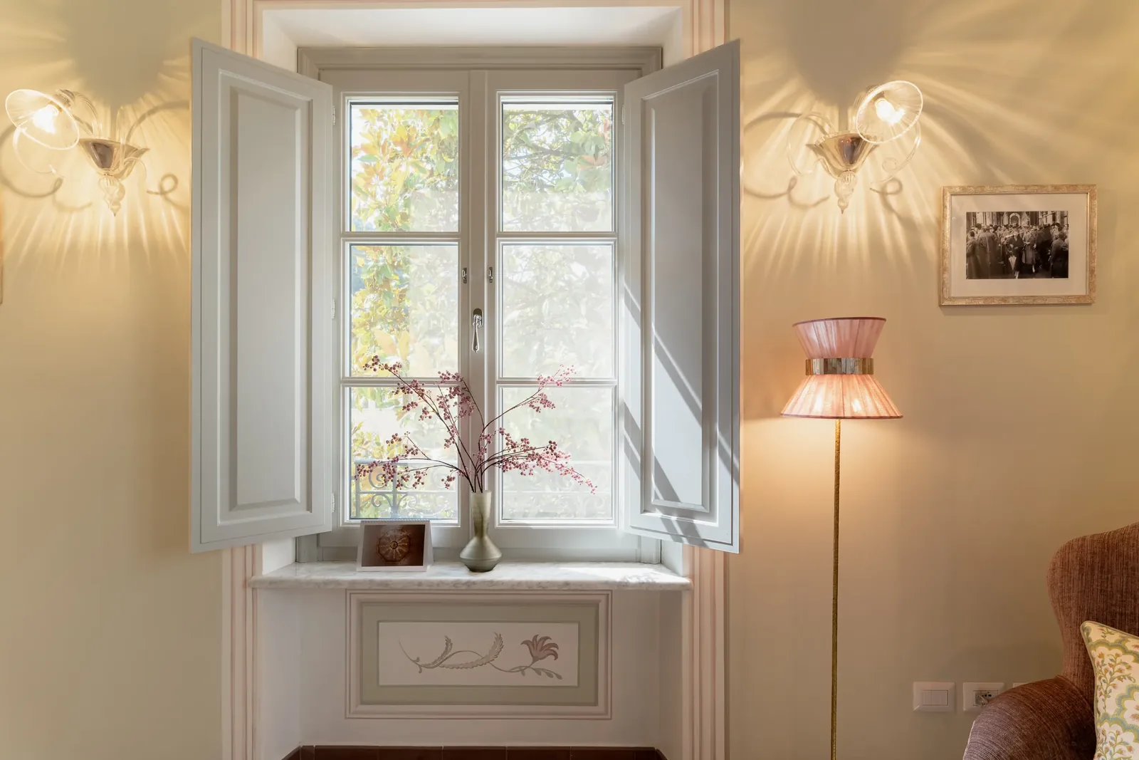 Window and floral detail in the Pink Room at Villa Marie